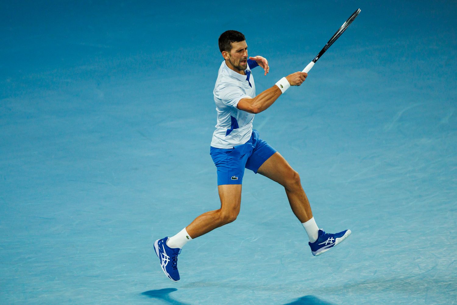 Novak Djokovic hits a shot at the 2024 Australian Open.